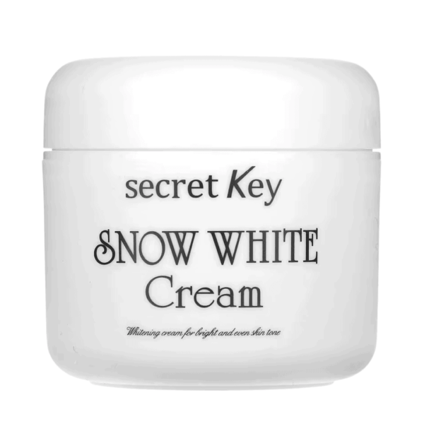 Lyse hvid ansigtscreme med sort tekst, der fremhæver "Secret Key Snow White Cream" til hudopstramning og lysning. Ideel til dem, der søger effektive hudplejeprodukter til klarere hud.